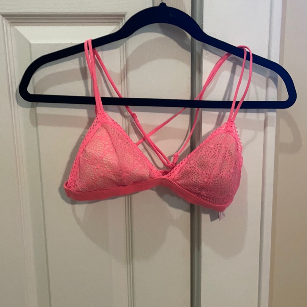 Womens neon link bralette with nude lade backdrop